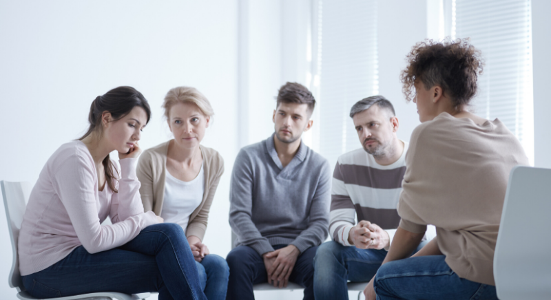 five people in a counseling lesson