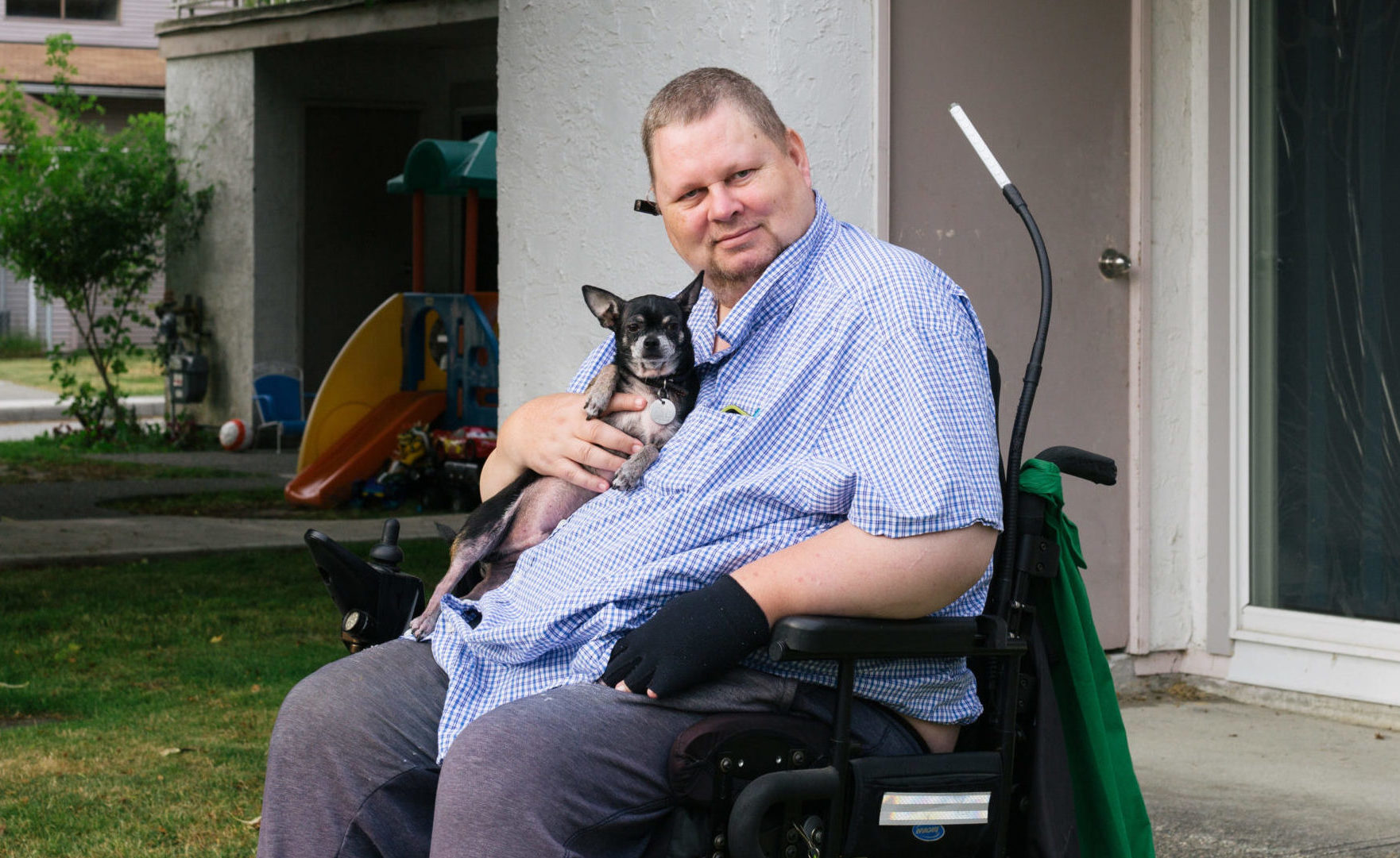 george holding a dog