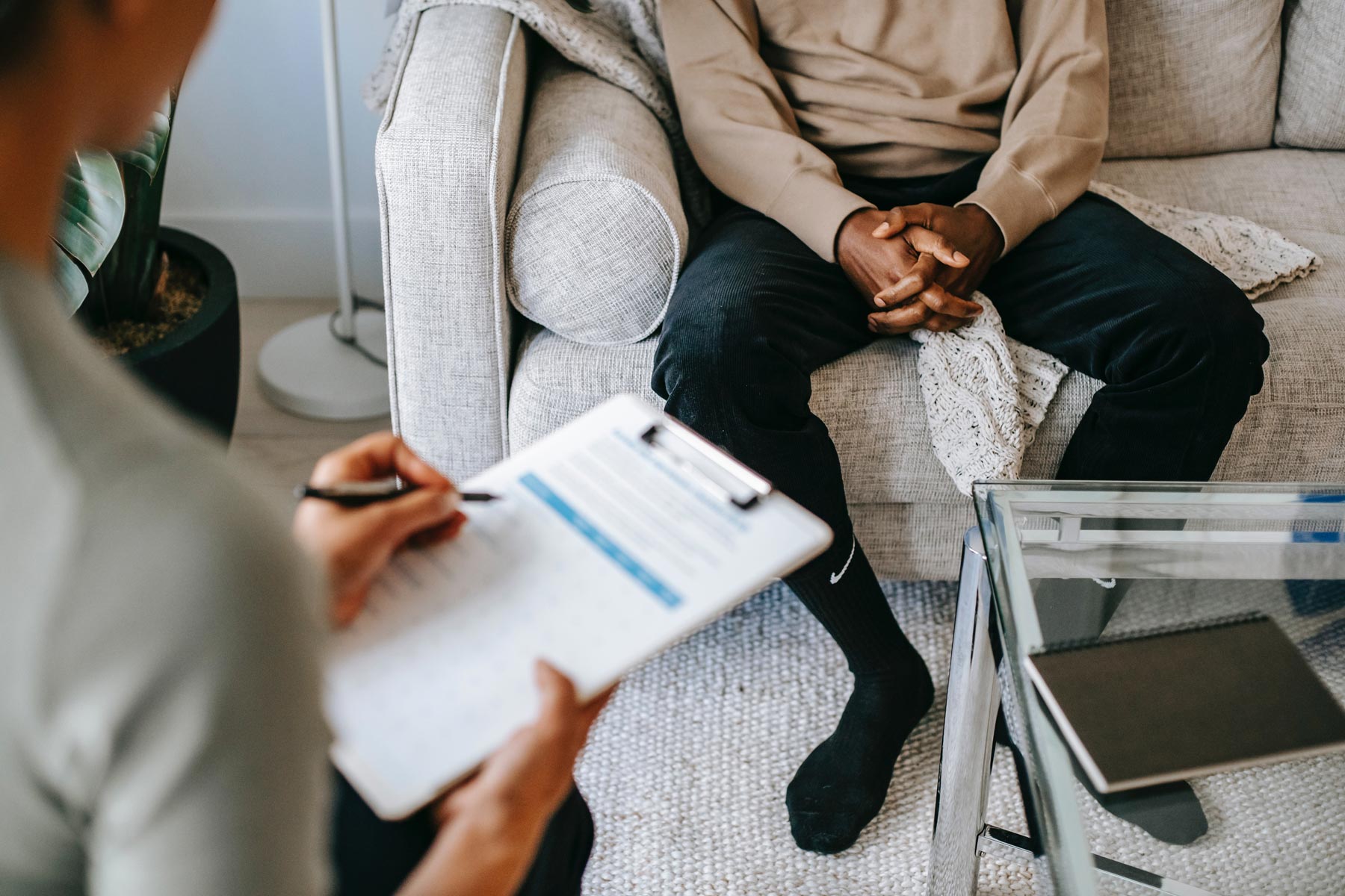 a counsellor talking to a man