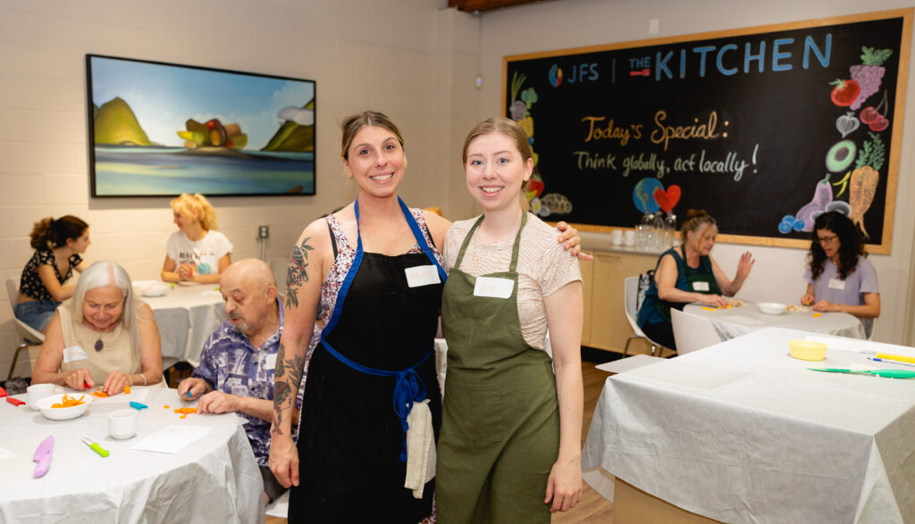JFS dietetics interns pose for the camera during a Community Kitchen event they're leading.