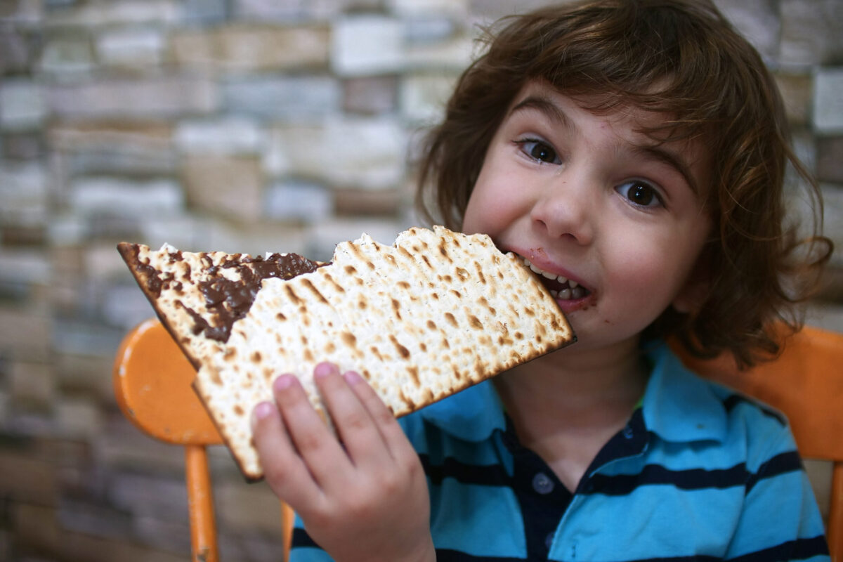 A,Beautiful,Boy,Eats,Matzah,On,Passover,,A,Jewish,Holiday.